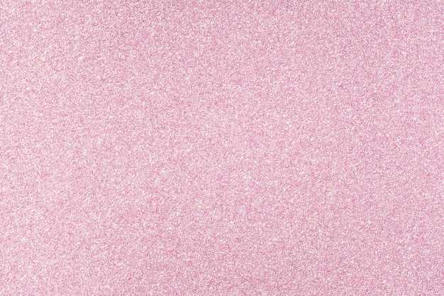 Fundo de textura rosa pastel brilho cintilante. cenário festivo de férias