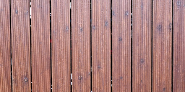 Fundo de textura vertical de madeira, pranchas de corte de madeira vintage velhas, tábuas escuras, painel velho