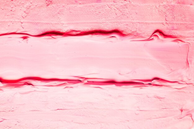 Fundo de tinta acrílica rosa manchada Superfície abstrata de efeito de sorvete de framboesa