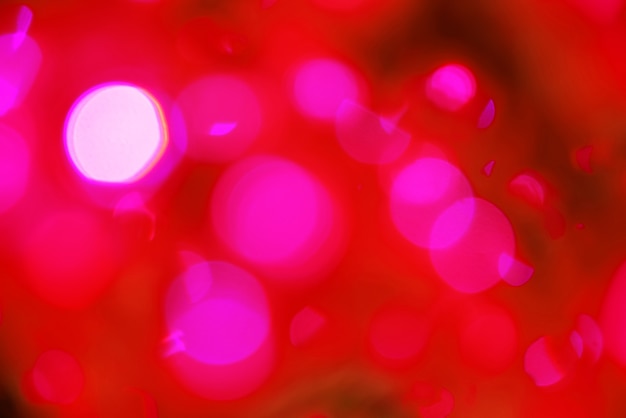 Fundo defocused das luzes do bokeh roxo. Fundo festivo de Natal