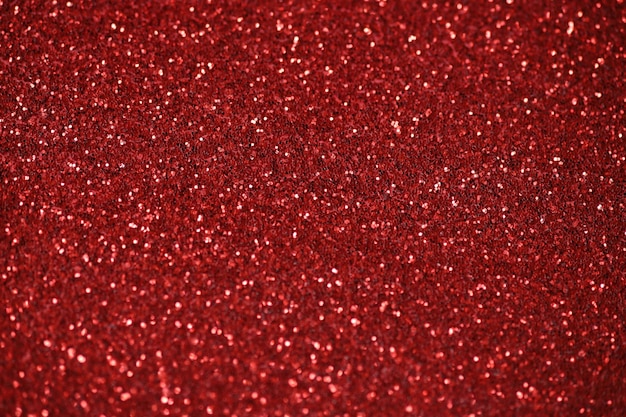 Foto fundo desfocado com brilho vermelho e textura de pontos brancos brilhantes