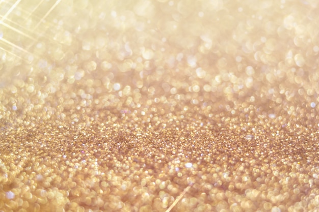 Fundo desfocado glitter dourado