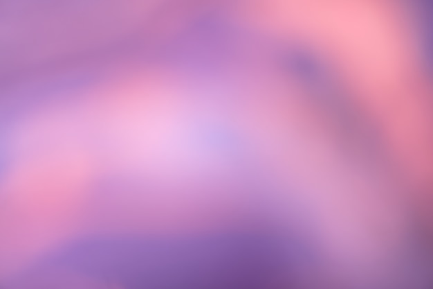 Fundo desfocado roxo e rosa escuro com padrão de linhas onduladas. Arte desfocada abstrato fundo gradiente violeta com blur e bokeh. Papel de parede lilás desfocado.