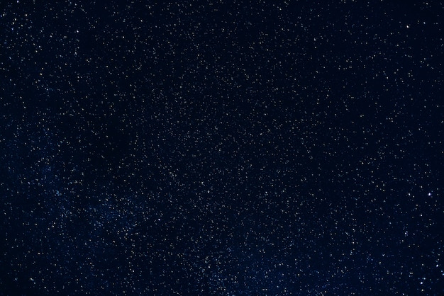 Foto fundo do céu noturno escuro estrelado