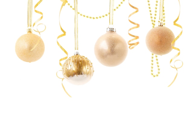 Fundo do natal com baubles do ouro