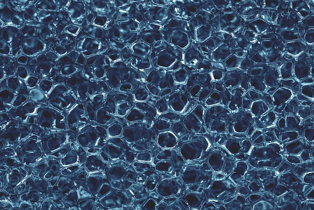 Fundo e textura abstrata de malha torcida ou emaranhada de material sintético fechado cor azul