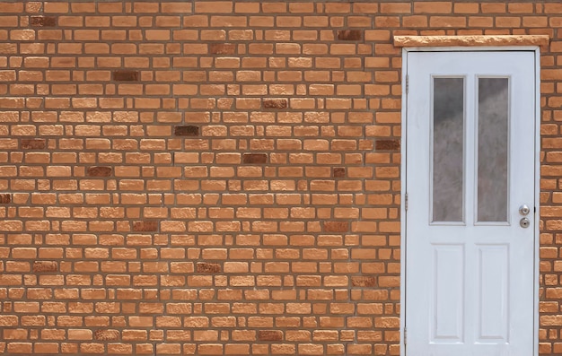 Fundo e textura da porta de madeira branca no painel de parede de tijolos pré-fabricados da casa vintage