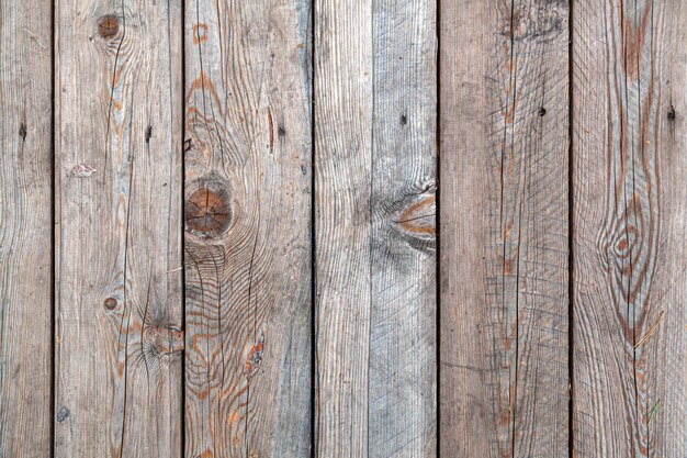 Fundo e textura de madeira velha decorativa listrada na parede de superfície