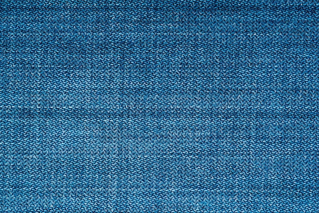 Fundo e textura de tecido denim ou jeans closeup