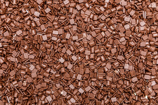 Foto fundo granulado com textura de chocolate ao leite