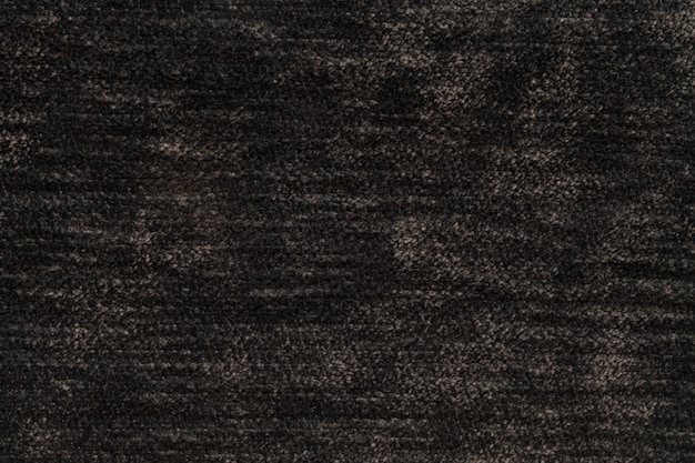 Fundo macio marrom escuro de pano macio e fofo, textura de tecido leve fralda