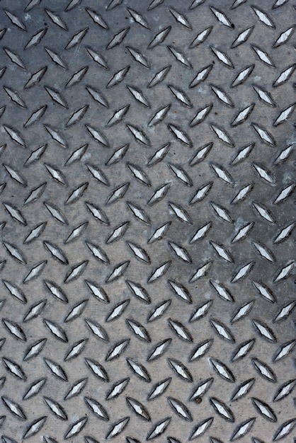 Foto fundo metálico de aço estampado a diamante com padrão