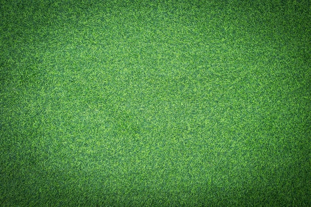 Foto fundo natural de grama artificial verde o fundo de design de arte abstrata do piso térreo de grama verde
