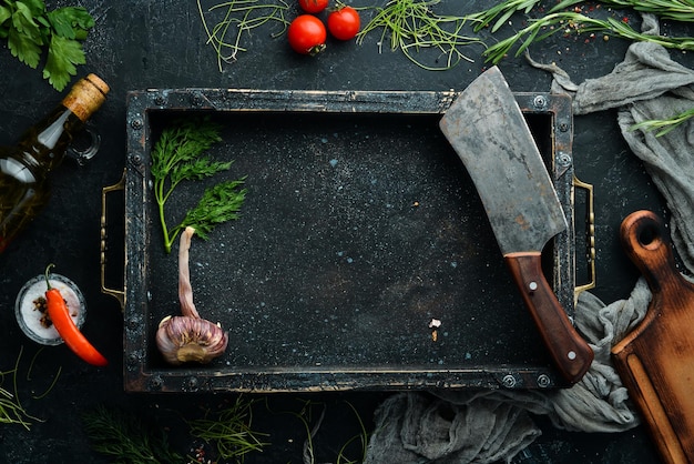 Fundo preto para cozinhar legumes e ingredientes vista superior espaço livre para o seu texto