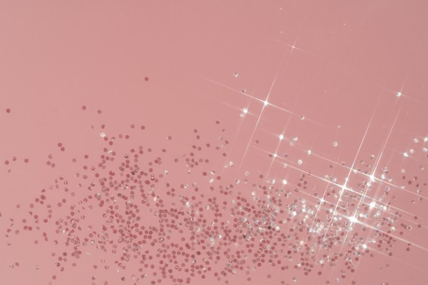 Foto fundo rosa abstrato com brilhos em forma de estrelas