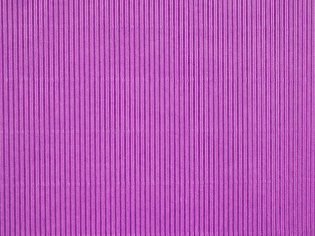 Fundo rosa com textura de papelão ondulado