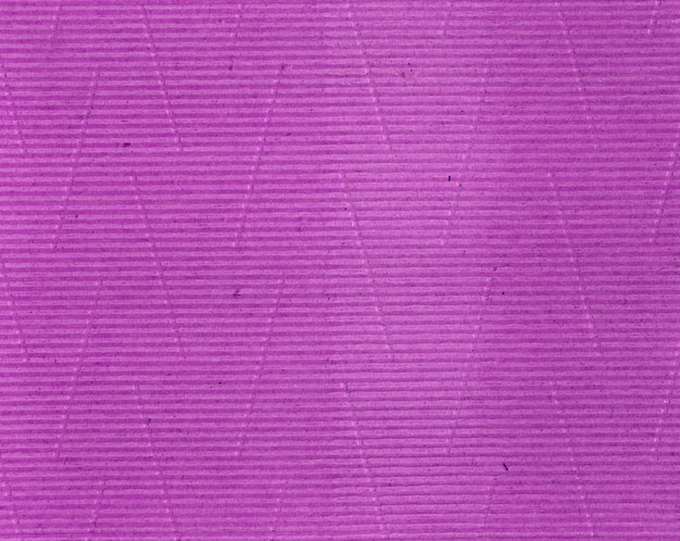 Fundo rosa com textura de papelão ondulado