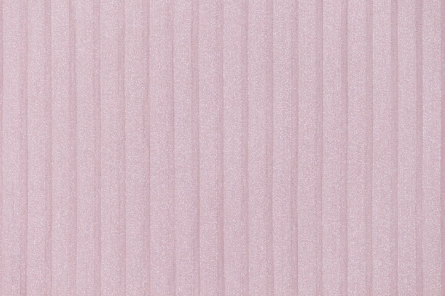 Fundo rosa delicado, nude plisse. linhas de pano geométrico. Tecido, têxtil close-up.
