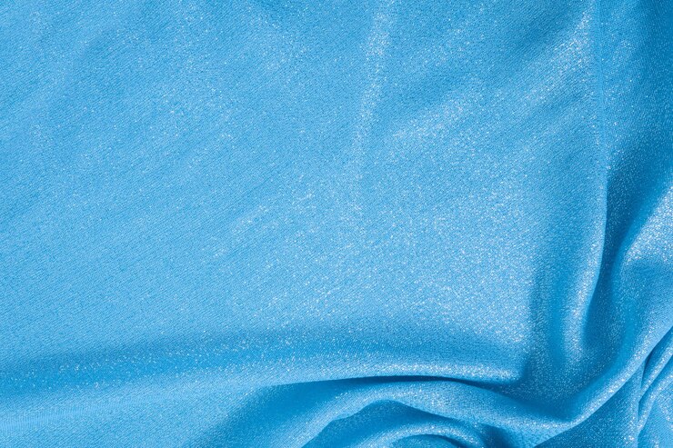 Foto fundo têxtil brilhante de tecido de lurex azul fino