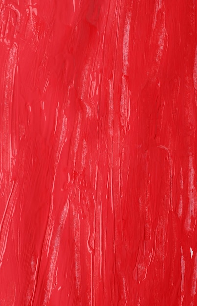 Fundo texturizado com guache vermelho áspero abstrato