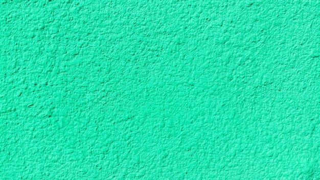 Fundo verde da parede de concreto