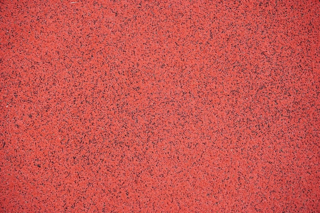 Fundo vermelho brilhante, textura de concreto. Concreto de textura vermelha.