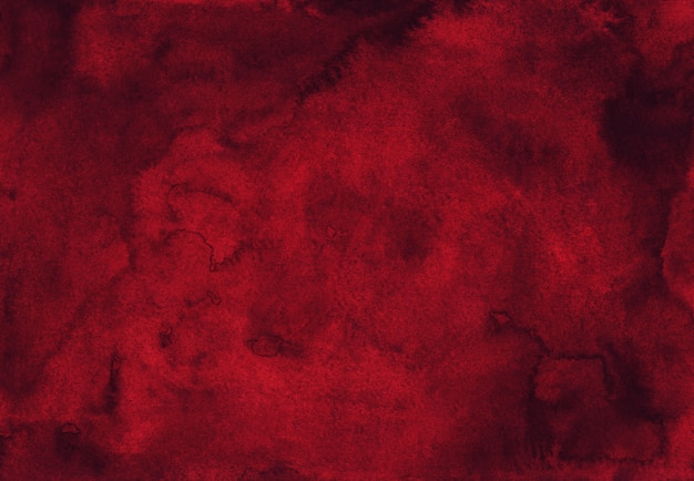 Foto fundo vermelho escuro da aquarela da textura pintado à mão. fundo de cor vinho tinto em aquarela.