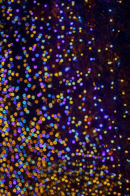 Fundos coloridos da luz abstrata do bokeh, luzes borradas para o feriado da luz da noite de Natal