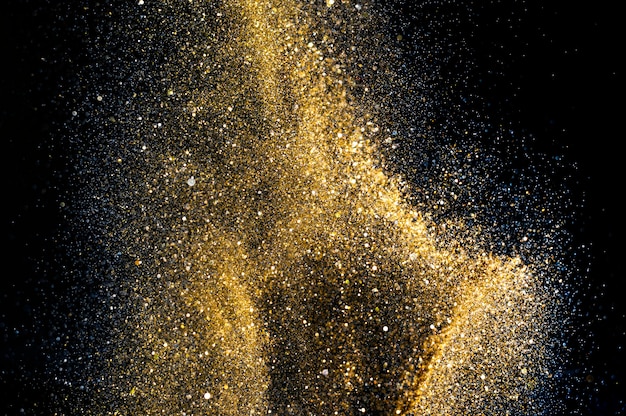 Funkeln beleuchtet Schmutzhintergrund, defocused abstraktes Twinkly Gold des Goldfunkelns beleuchtet Hintergrund.