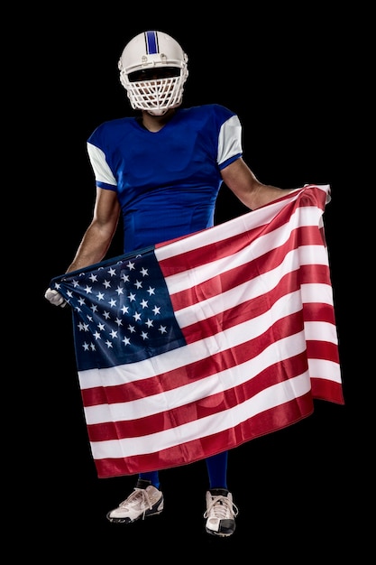 Fußballspieler mit einer blauen Uniform und einer amerikanischen Flagge, auf einer schwarzen Wand