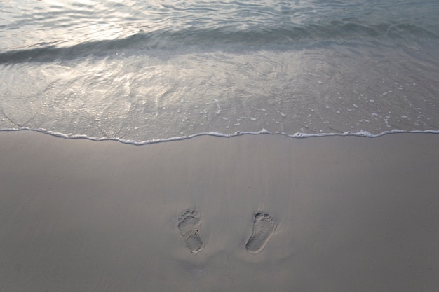 Fußspuren am Strand