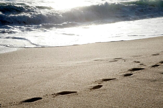 Fußspuren am Strand