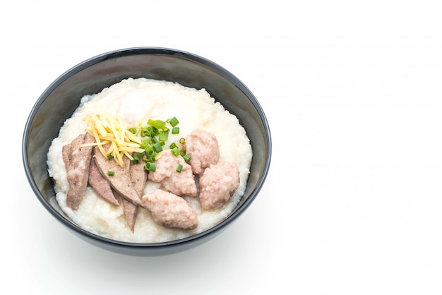 gachas de arroz con carne de cerdo y huevo