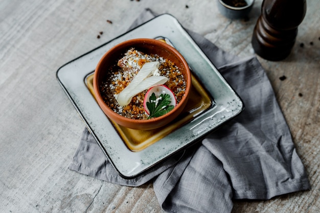 Gachas de avena con pollo y cebolla