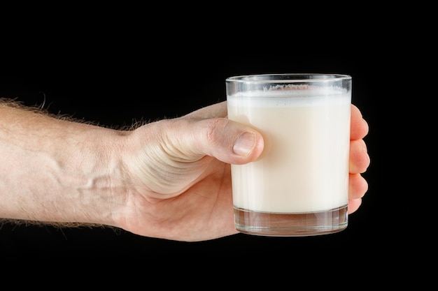 Gainer in einem Glas in der Hand