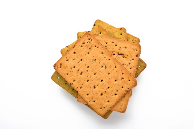 Galleta con semillas de lino y salvado de avena de forma rectangular. Merienda para una nutrición adecuada.