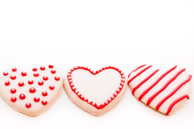 Galletas Gourtmet en forma de corazón decoradas para San Valentín.