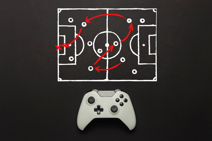 Foto gamepad blanco sobre un fondo negro. se agregó un esquema de campo de fútbol. tácticas del juego. concepto de juego de fútbol en la consola, juegos de computadora. vista plana, vista superior.