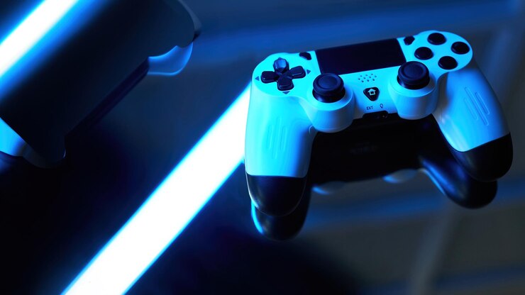Foto gamepad em fundo abstrato com efeitos de luz