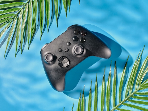 Gamepad em fundo azul - vista superior