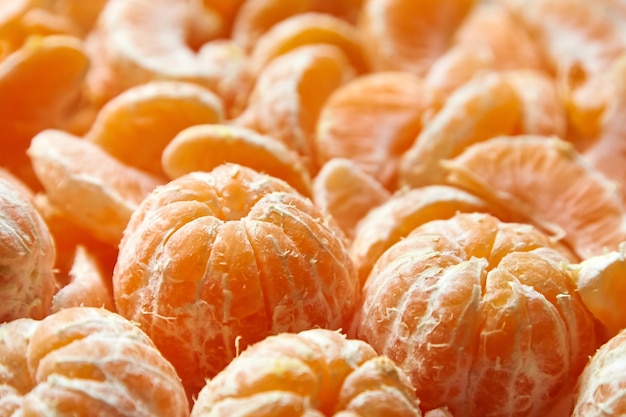 Ganze Mandarine Zitrus geschälte Früchte