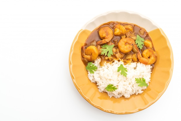 Garnelen in Currysauce auf Reis