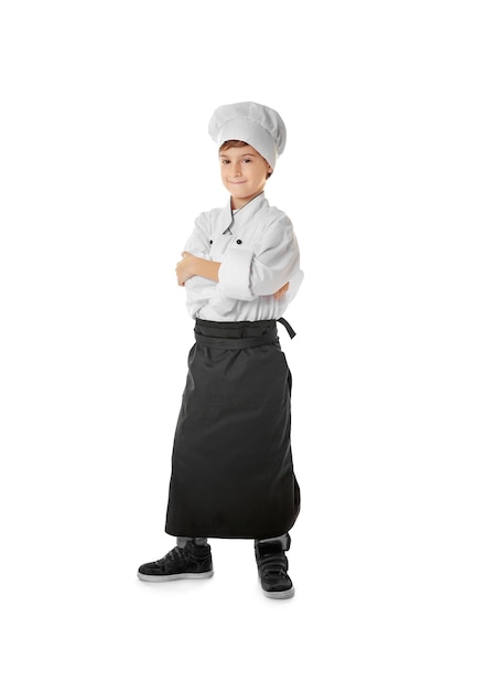 Garoto bonito em uniforme de chef em fundo branco