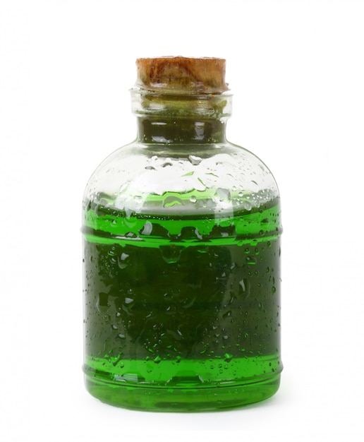 Foto garrafa de líquido verde