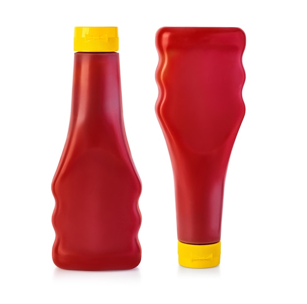 Foto garrafas de ketchup isoladas no fundo branco