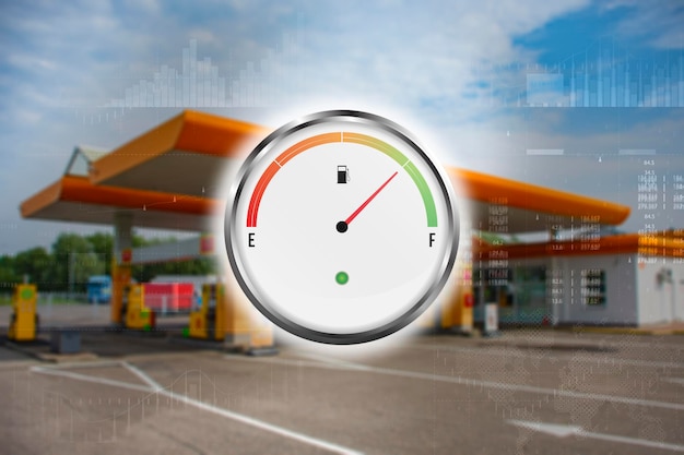Gasolinera con indicador de combustible para automóviles Rellene verde en desenfoque Foto borrosa de fondo