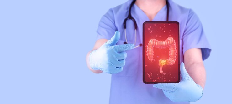 Foto gastroenterologista examina o intestino grosso com tecido cancerígeno em um comprimido câncer colorretal