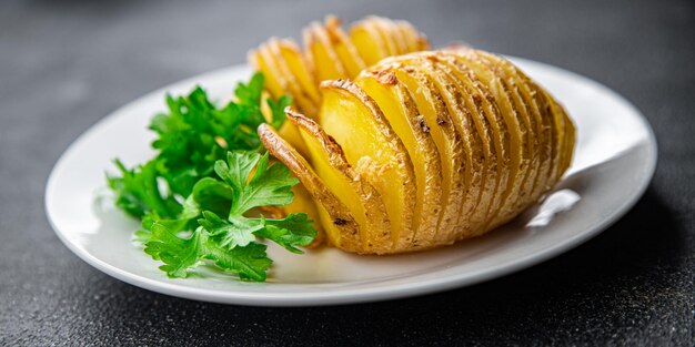 gebackene Kartoffelscheibe Akkordeon Gemüse Mahlzeit Speise Snack auf dem Tisch Kopierraum Lebensmittel Hintergrund