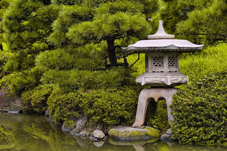 Foto gebautes gebäude im garten gegen bäume im park