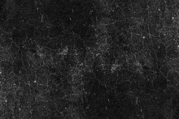 Gebrochene Wandoberfläche aus dunklem Beton mit schwerer Grunge-Textur für den Hintergrund